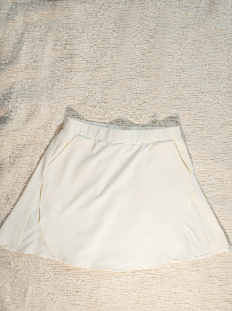 sporty fake shirt extender tennis skirt with pockets layered with sweater vest