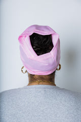 woman wearing a light pink under scarf tube cap for hijab