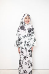 two piece salah outfit with hijab and skirt printed with black and white floral