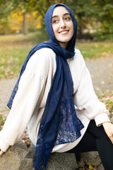solid navy hijab made with modal fabric and embellished with lace at the ends