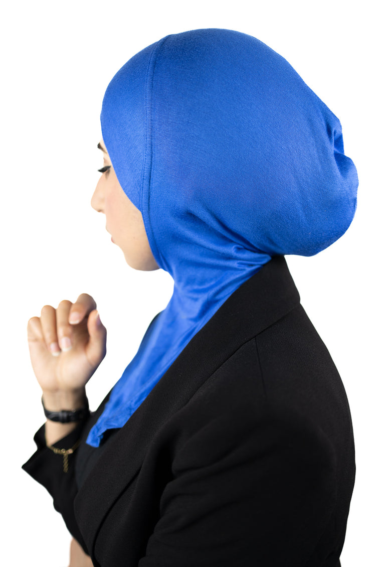 muslim woman wearing a black blazer and royal blue ninja underscarf