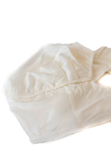 jersey off white satin lined under cap with adjustable tie and silicone non slip grip
