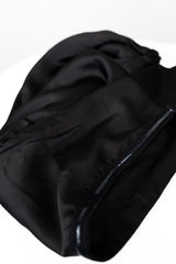 jersey black satin lined under cap with adjustable tie and silicone non slip grip