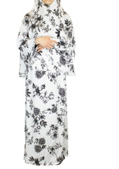 two piece salah outfit with hijab and skirt printed with black and white floral