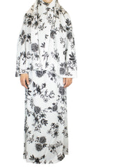two piece salah outfit with hijab and skirt printed with black and white floral