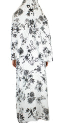 two piece salah outfit with hijab and skirt printed with black and white floral