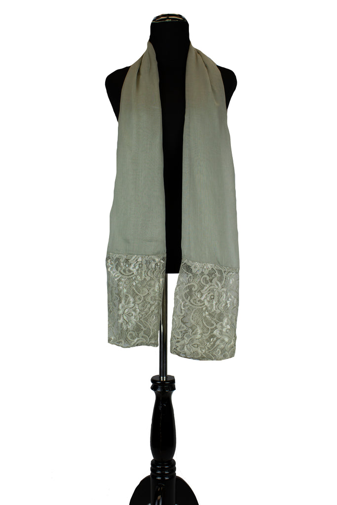 solid gray hijab made with modal fabric and embellished with lace at the ends