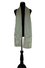 solid gray hijab made with modal fabric and embellished with lace at the ends