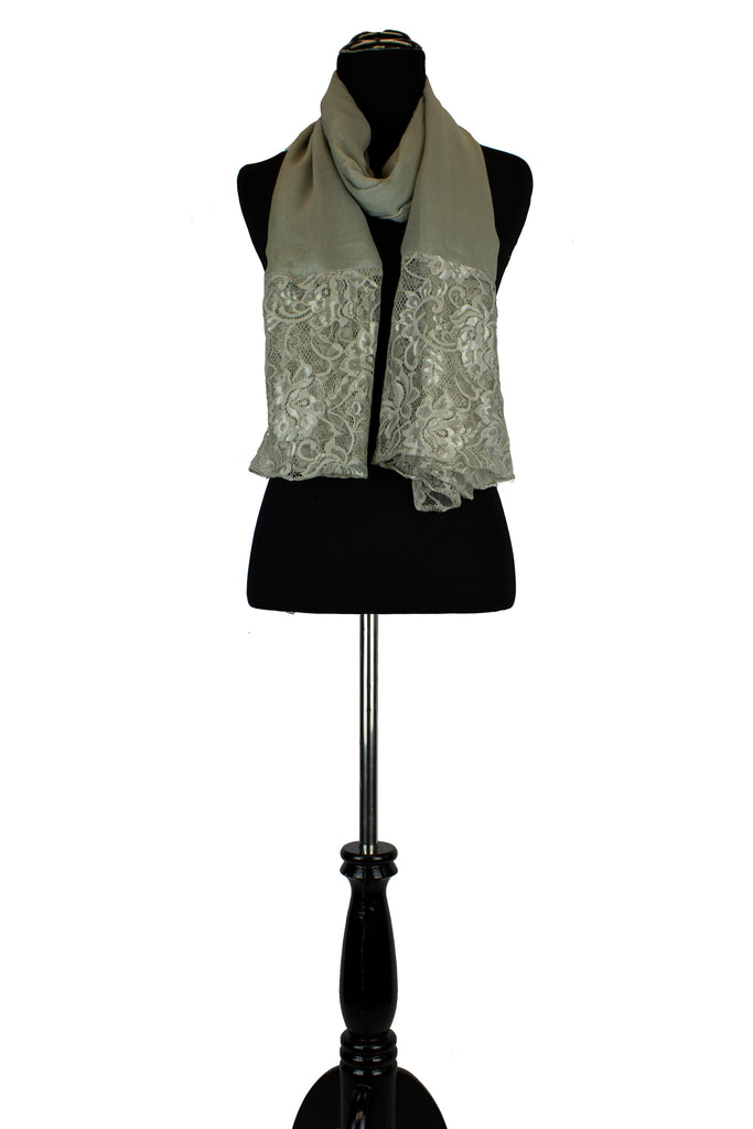 solid gray hijab made with modal fabric and embellished with lace at the ends
