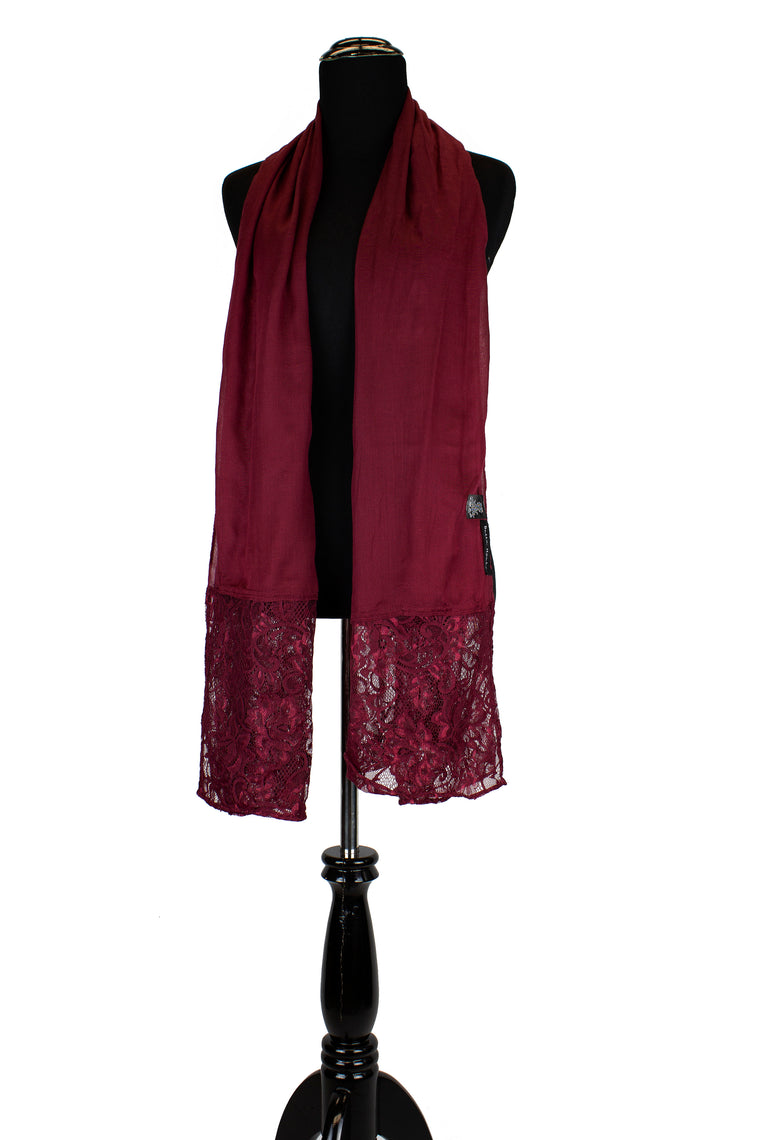 solid burgundy hijab made with modal fabric and embellished with lace at the ends