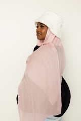 woman wearing modal hijab in different sizes in a light pink shade 