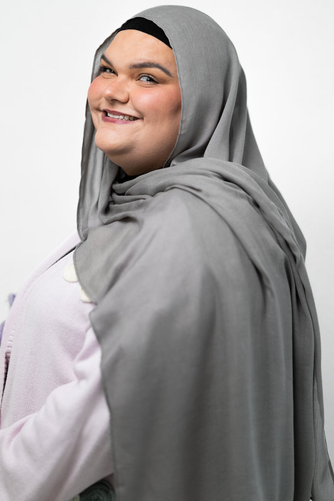 gray pebble shade modal hijab on a woman
