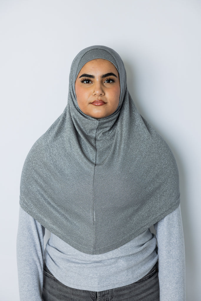 woman wearing dark gray shimmer two piece amira slip on hijab