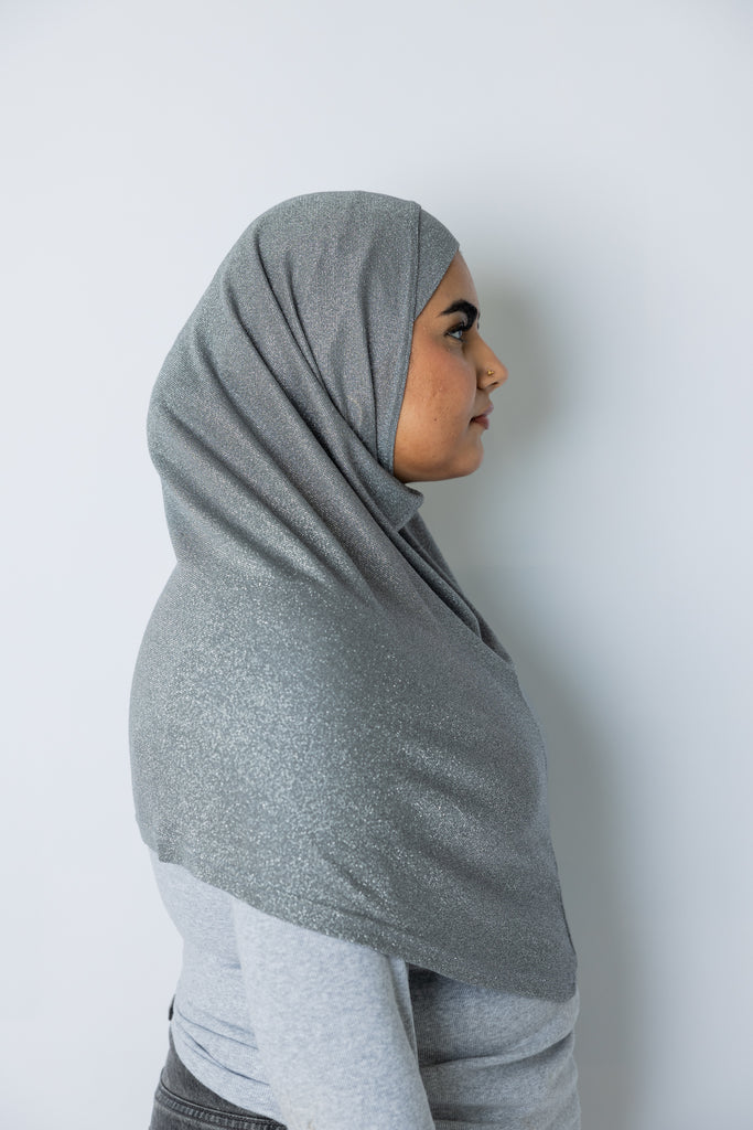 woman wearing dark gray shimmer two piece amira slip on hijab