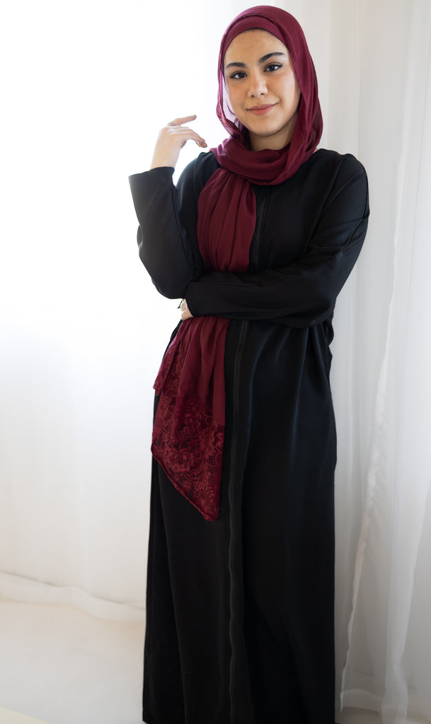 simple black abaya with a zipper and pockets