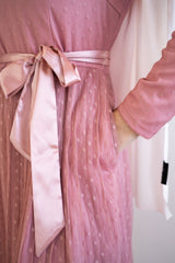 pink polka dot long sleeve maxi dress with satin waist belt