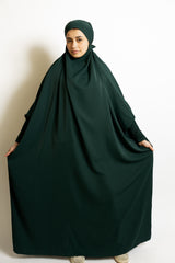 one-piece prayer outfit features a quick attached tie-back hijab