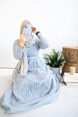 long sleeve maxi dress in baby blue lace with a satin waist tie