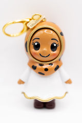 olive toned honey hijabi figurine in cheetah print hijab on golden keychain