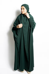 one-piece prayer outfit features a quick attached tie-back hijab