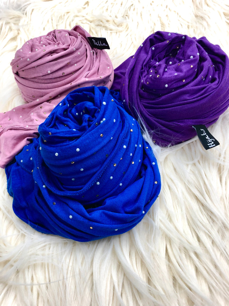 bundle of three jersey hijabs embellished with pearls in pink, royal blue, and purple