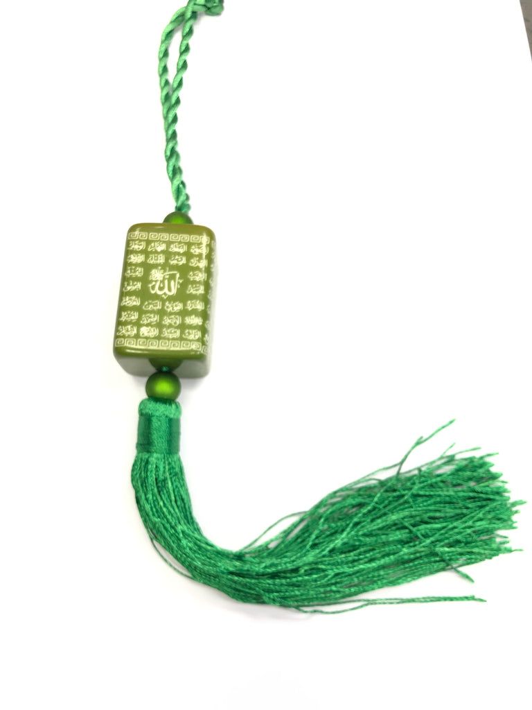 green ornament with names of allah