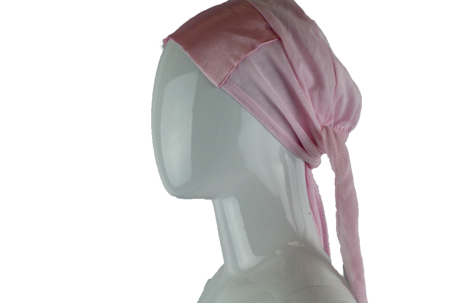 light pink tie back under cap with a satin trim