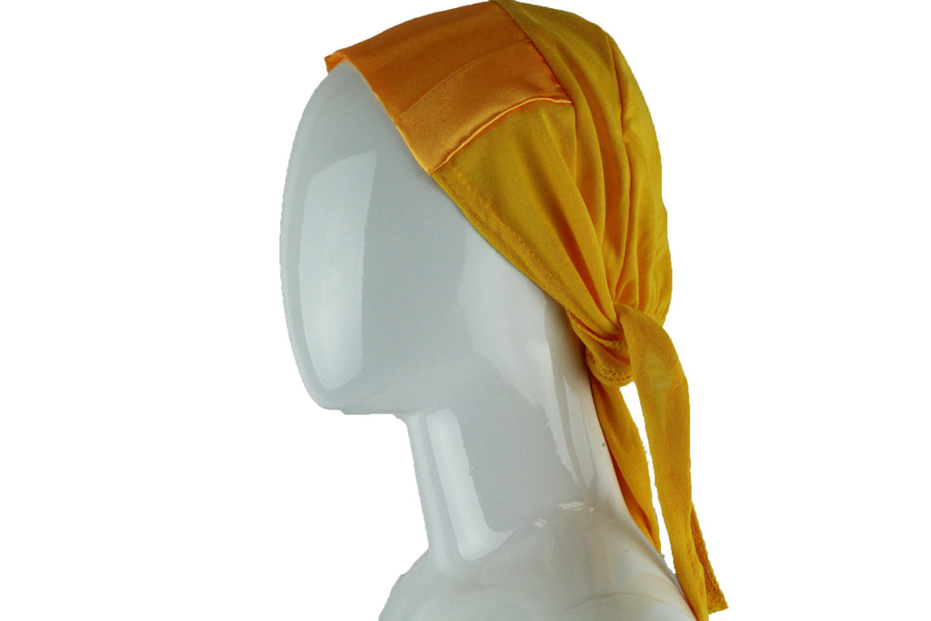 gold tie back under cap with a satin trim