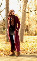 a hijabi wearing a modest maxi cardigan with pockets and chiffon hijab from bella hijabs