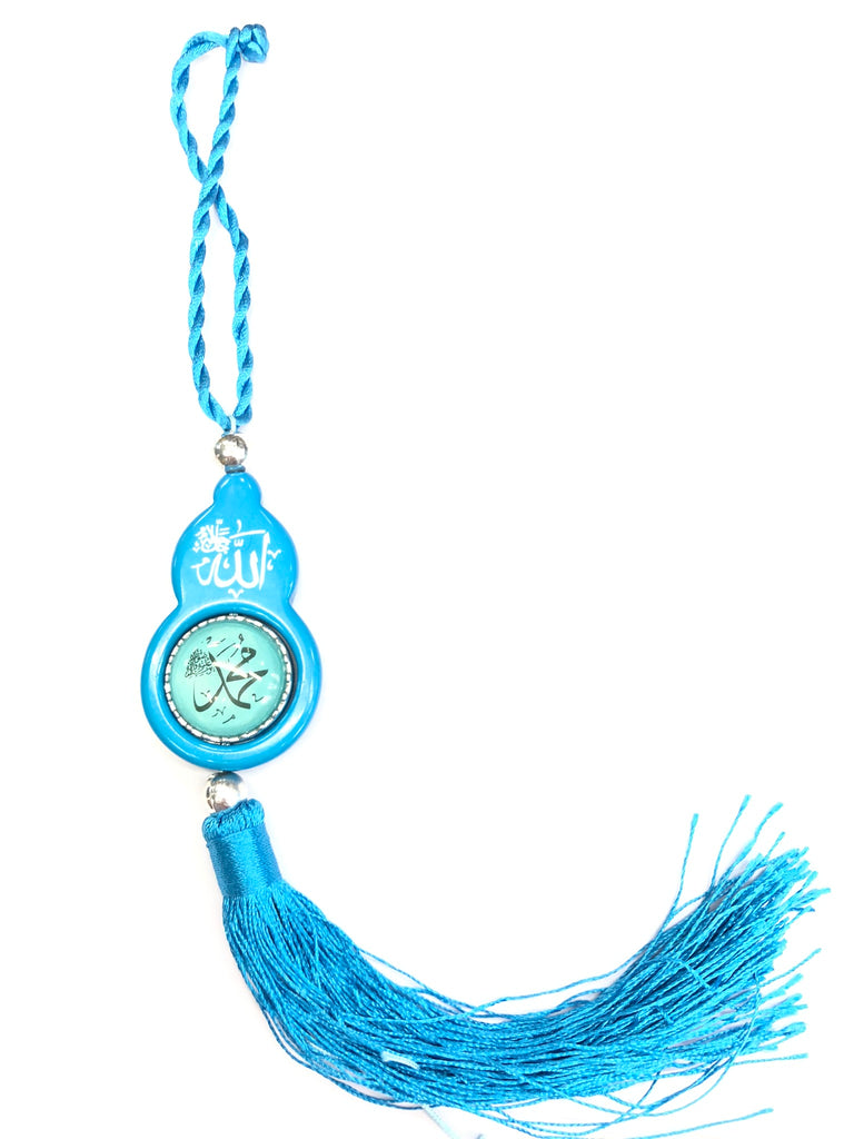 blue ornament with allah and mohammad written on it