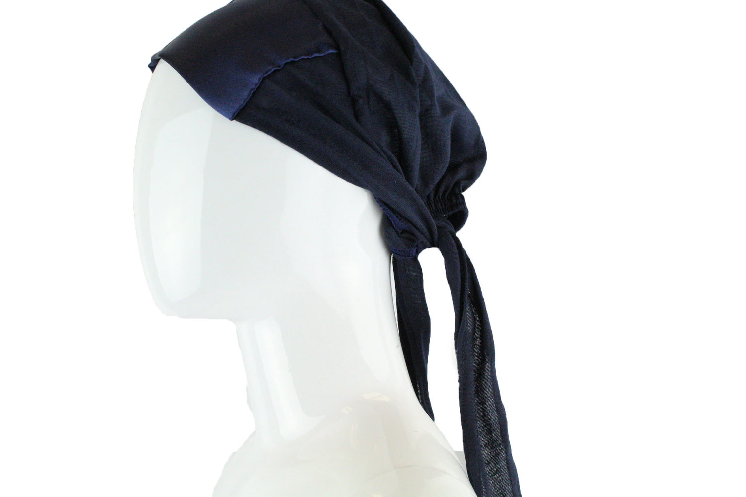 navy blue tie back under cap with a satin trim