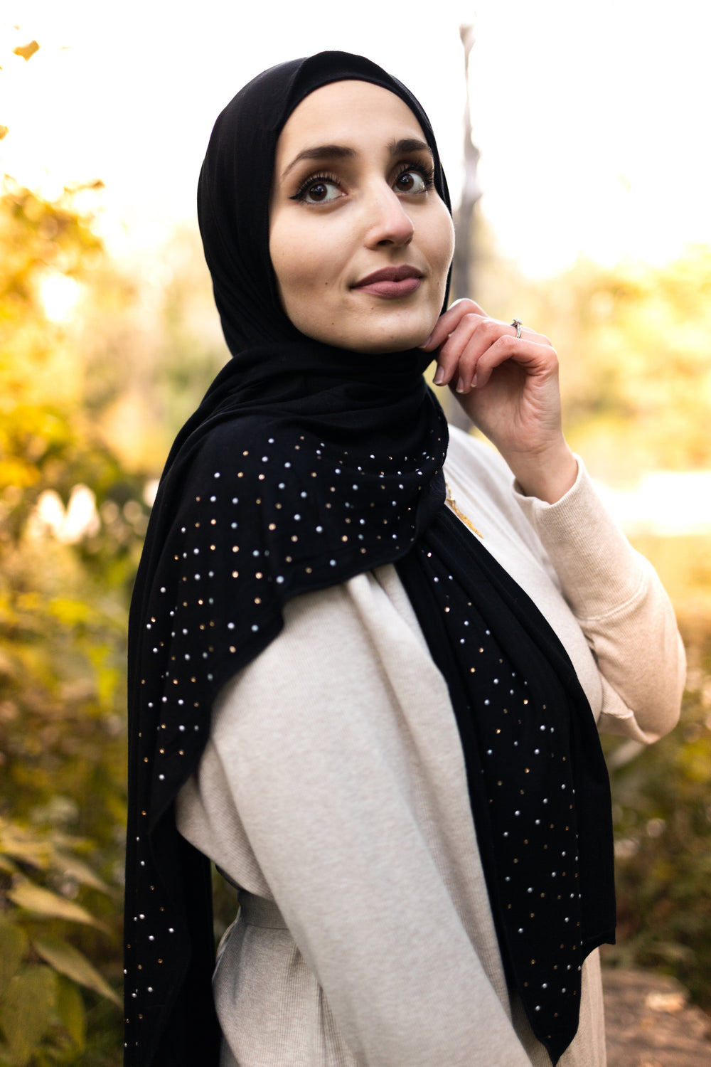 black jersey hijab embellished with pearls  Edit alt text