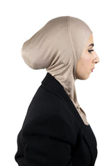 muslim woman wearing a black blazer and taupe ninja underscarf