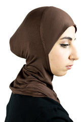 muslim woman wearing a beige blazer and brown ninja underscarf