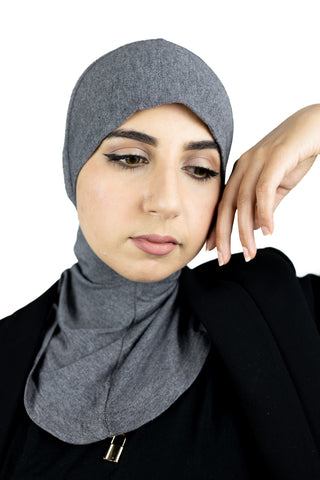 muslim woman wearing a beige blazer and heather gray ninja underscarf