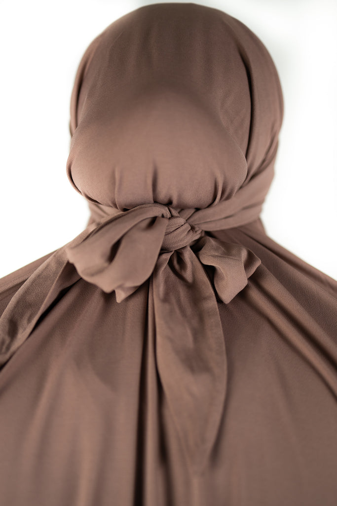 taupe stretchy two piece jilbab prayer set with adjustable hijab with tie and pockets and scrunched up sleeves and skirt