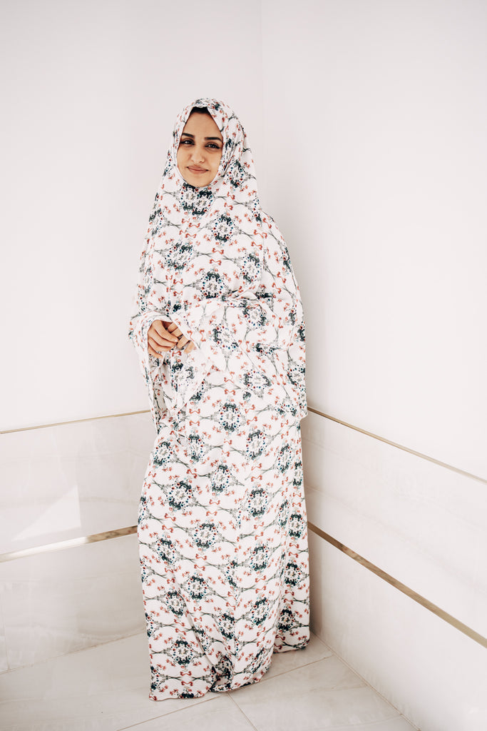 pink and white floral printed two piece prayer set with hijab and adjustable stretchy skirt