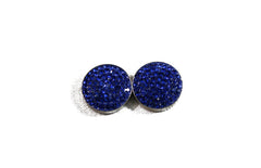a pair of two royal blue magnet pins with crystals