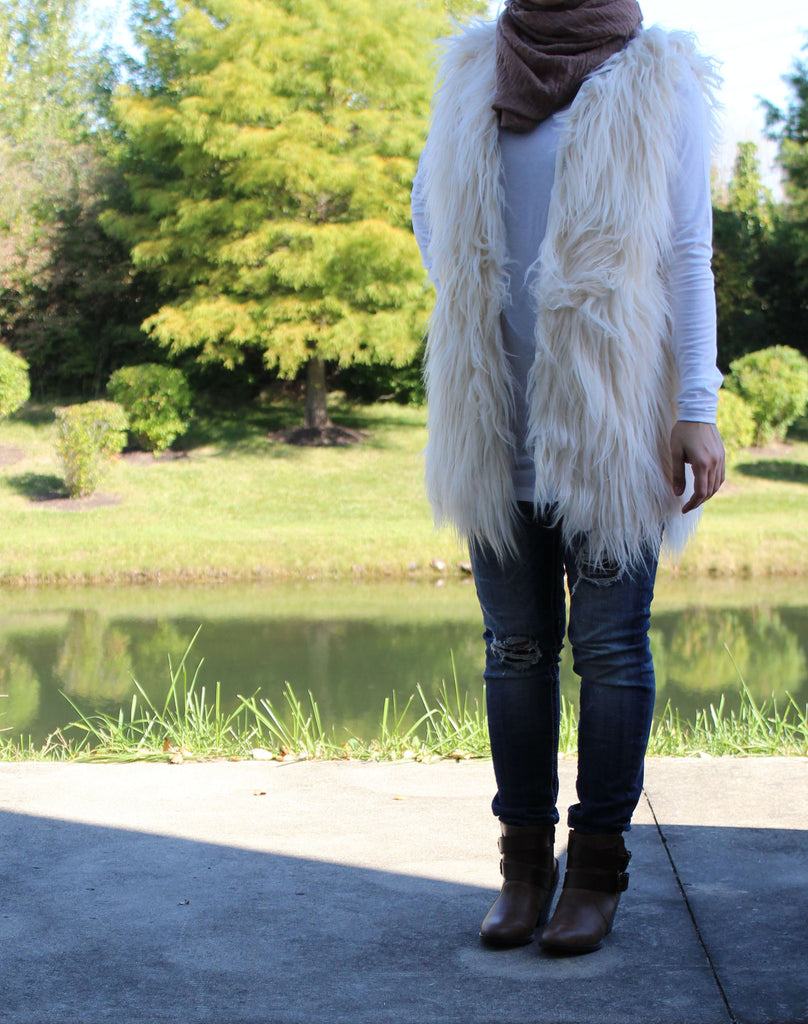 modest sleeveless faux fur vest in ivory 