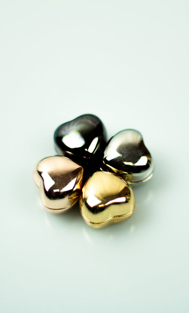 group of heart shaped magnet hijab pins in black gold silver and rose gold