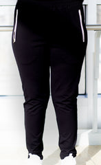 long modest and loose black workout pants with zippers and pockets