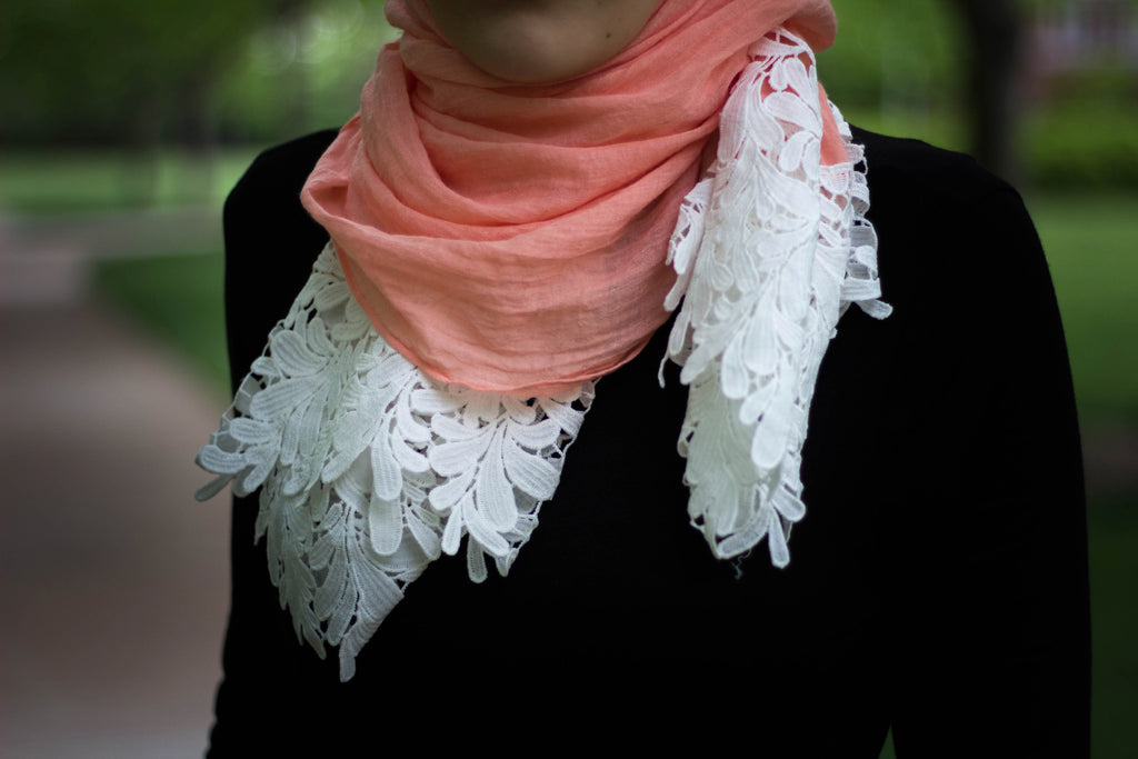 salmon viscose hijab with white embroidery lace on the ends