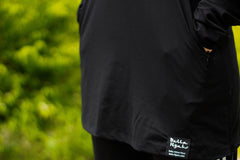 pockets on a black long sleeve workout top