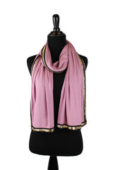 blush jersey hijab embellished with a gold trim along the edges