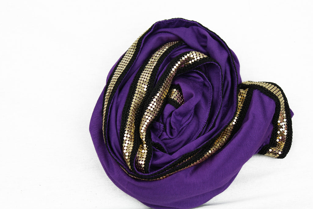 purple jersey hijab embellished with a gold trim along the edges