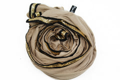 taupe jersey hijab embellished with a gold trim along the edges