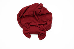 maroon slip on turban with a large bow on the front