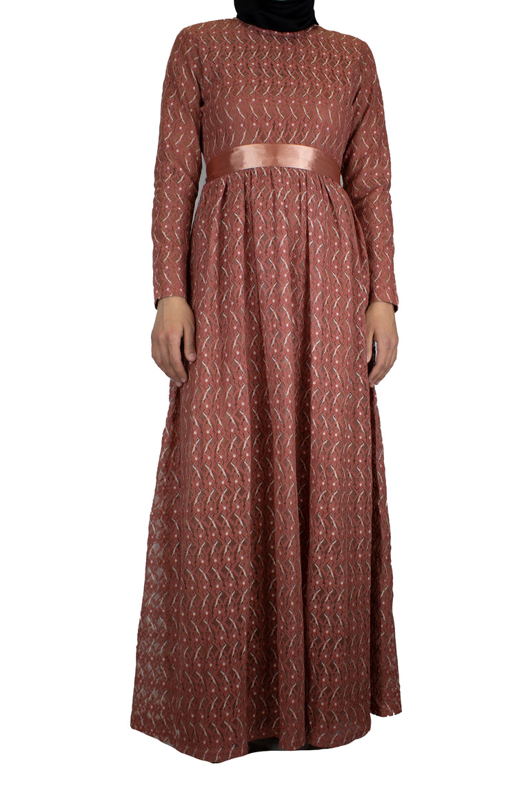 long sleeve maxi dress in burnt orange lace with a satin waist tie