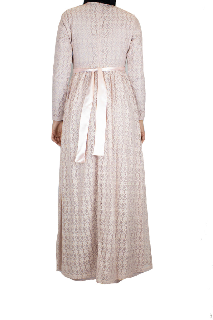 long sleeve maxi dress in pink lace with a satin waist tie