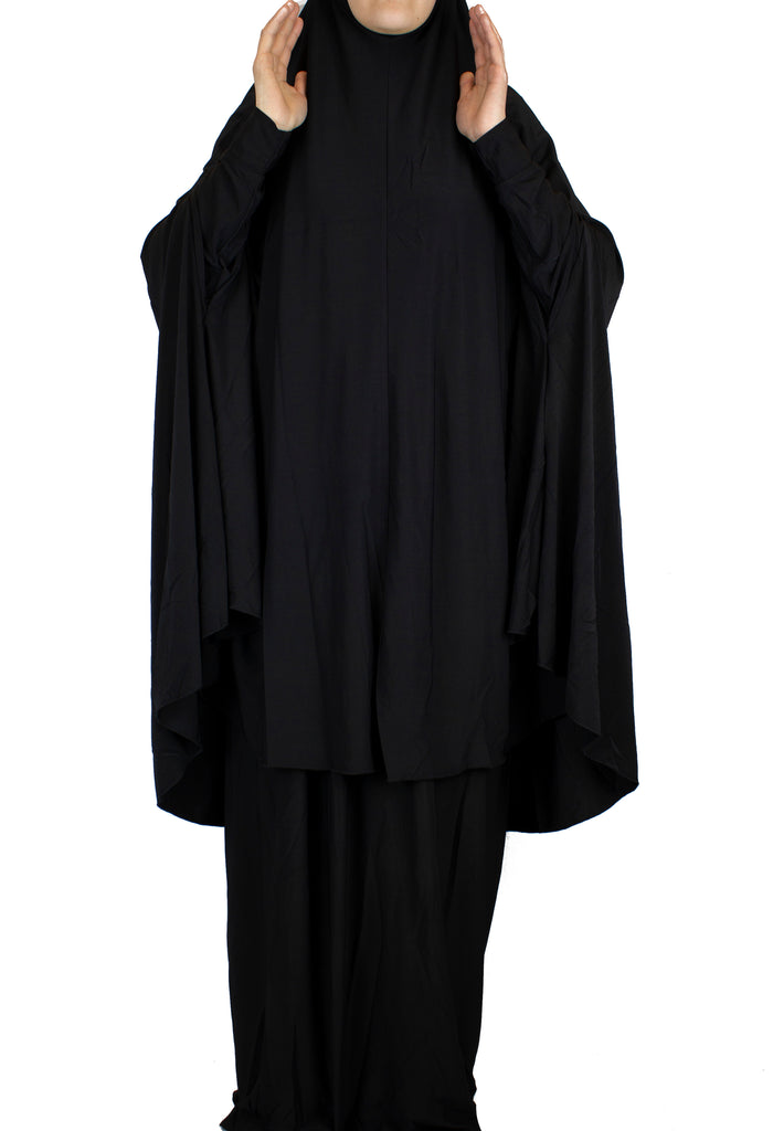 black two piece prayer set with a long khimar that covers to the knees and a maxi skirt